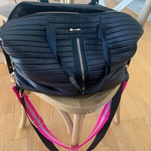 Stella and dot black bag and pink strap